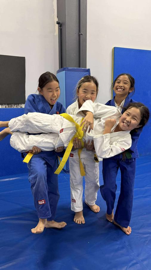 Judo students having fun after class